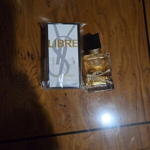 Yves Saint Laurent Libre Perfume with Gold and Black Accents